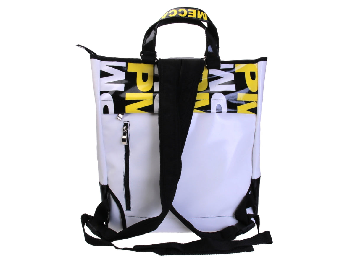 2 IN 1 BRIEFCASE AND BACKPACK IN BLACK WHITE YELLOW. MODEL HYBRID MADE OF LORRY TARPAULIN.