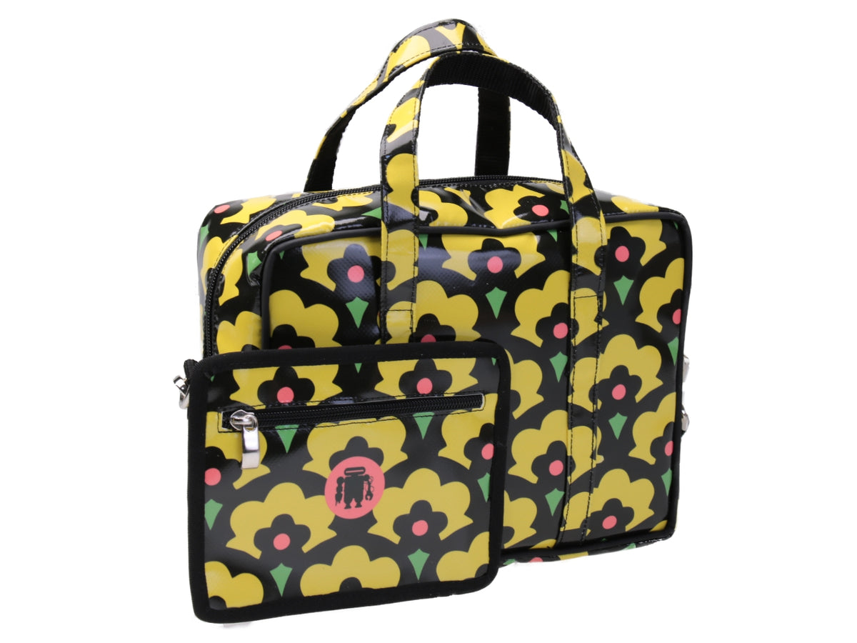 YELLOW RECTANGULAR WOMEN&#39;S BAG FLORAL FANTASY. MODEL PINCA MADE OF LORRY TARPAULIN.