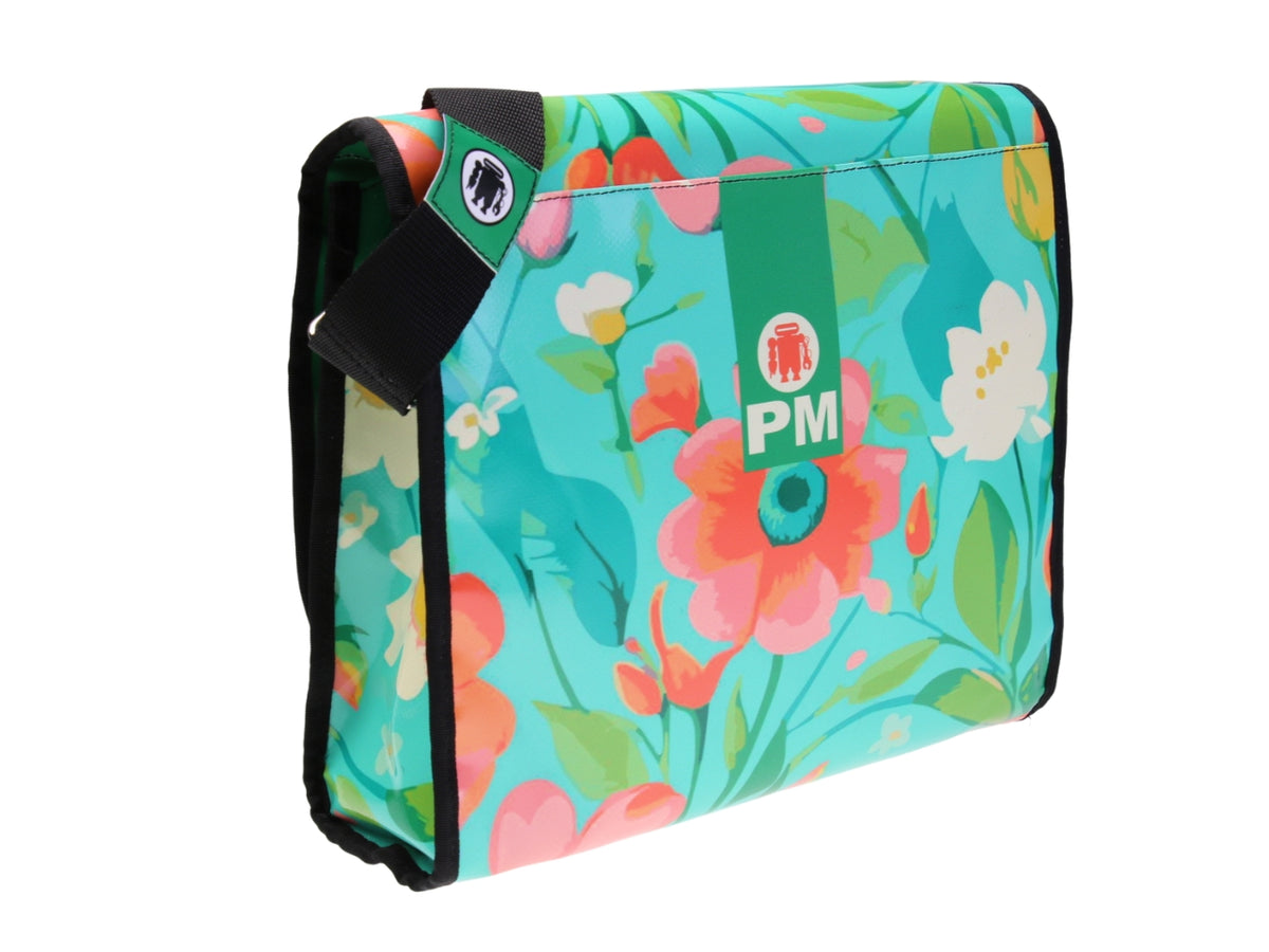 ...WATER GREEN CROSSBODY BAG WITH FLORAL FANTASY. MODEL BREAK MADE OF LORRY TARPAULIN.