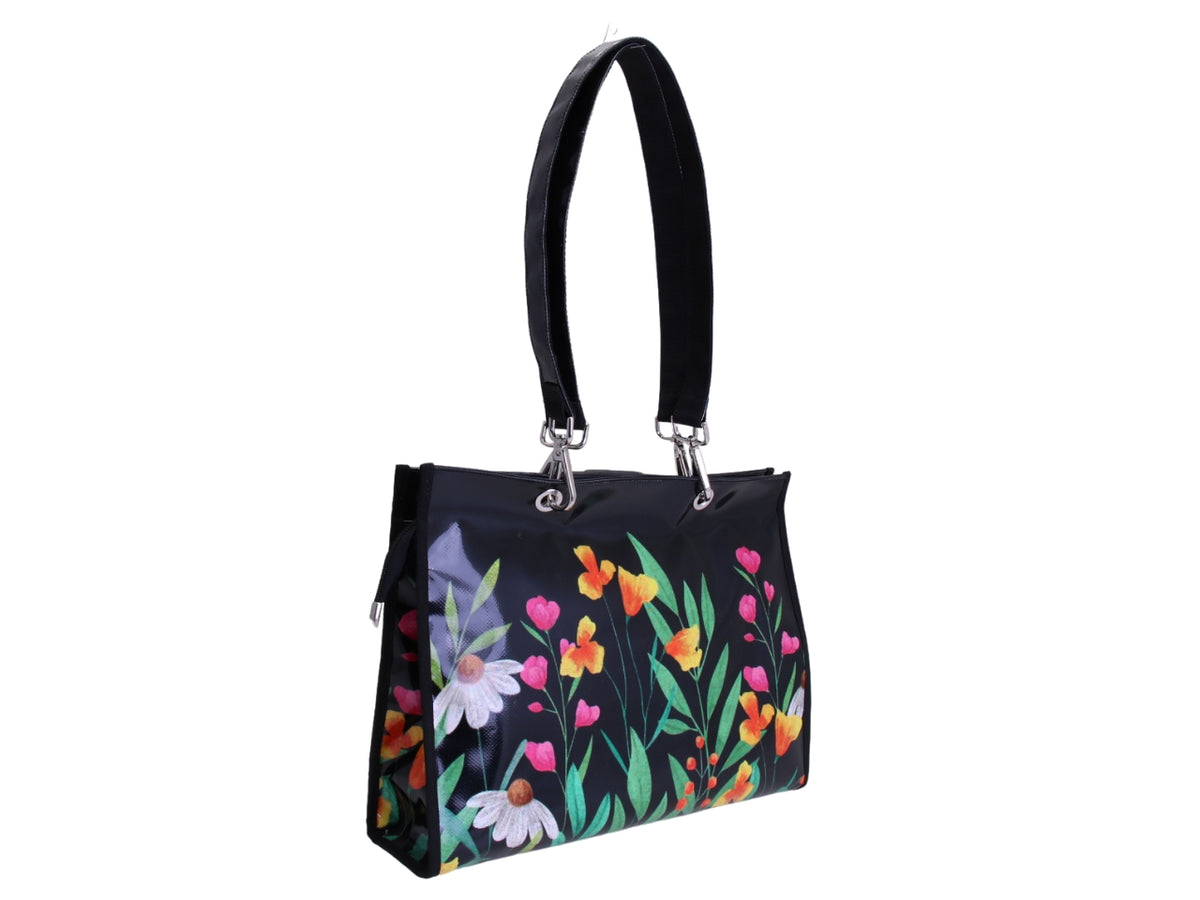 BLACK SHOPPER BAG WITH FLORAL FANTASY. MODEL PEPE MADE OF LORRY TARPAULIN.