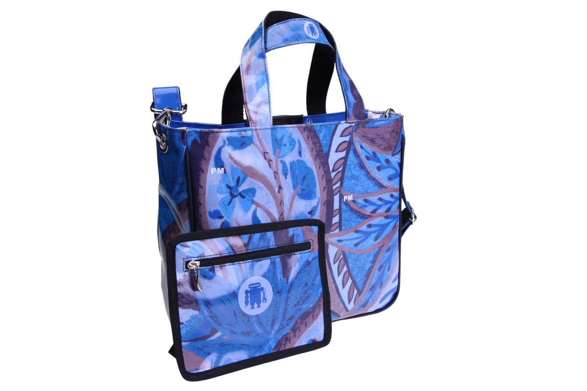 LIGHT BLUE TOTE BAG WITH FLORAL FANTASY. MODEL GLAM MADE OF LORRY TARPAULIN.