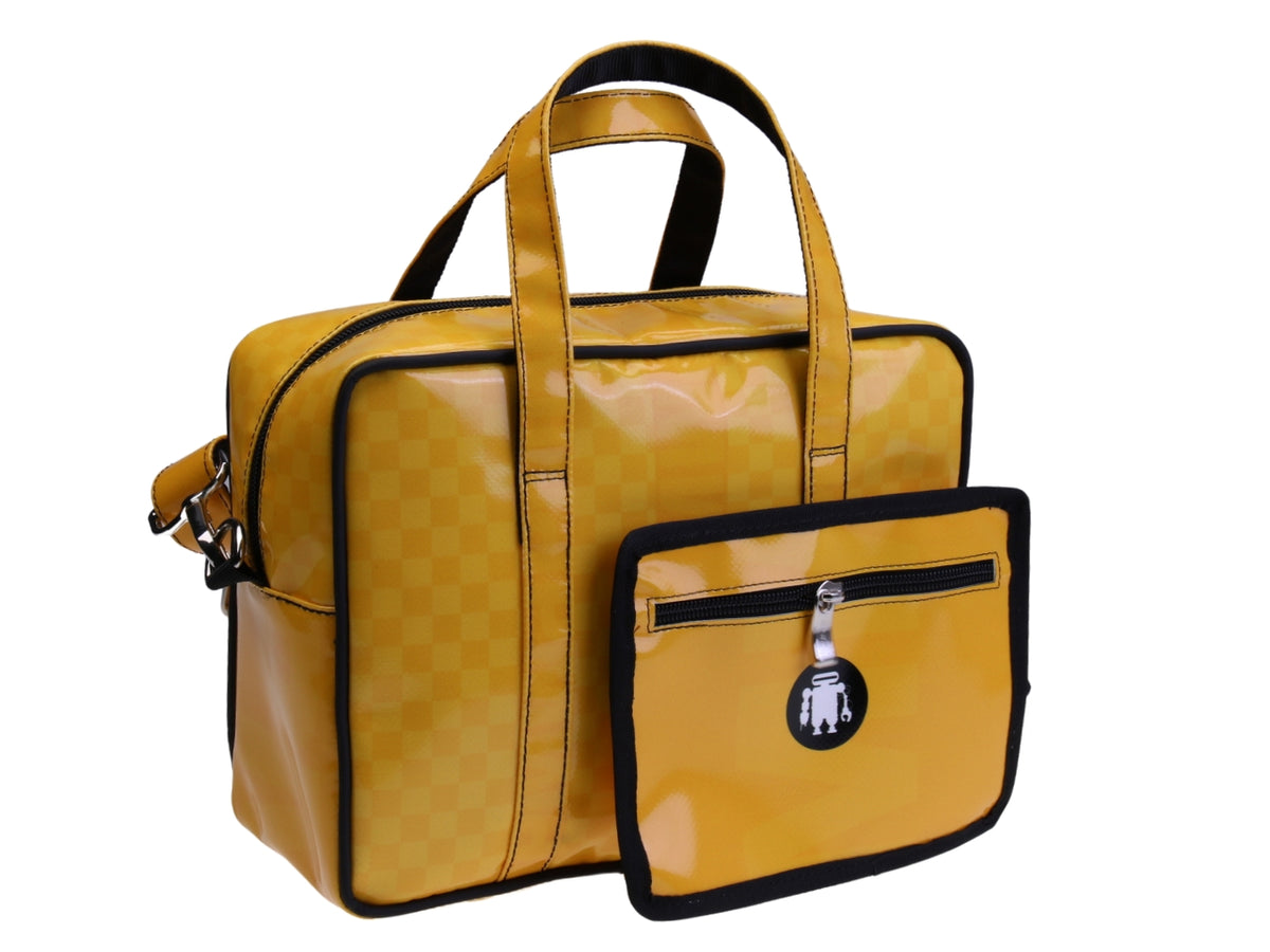 ....YELLOW RECTANGULAR WOMEN&#39;S BAG. MODEL PINCA MADE OF LORRY TARPAULIN.