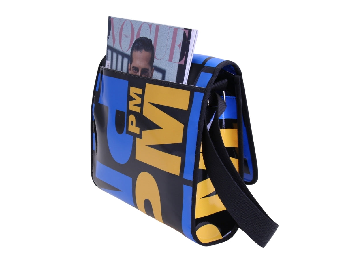 _ CROSSBODY BAG BLACK AND BLUE WITH LETTERING FANTASY. MODEL BREAK MADE OF LORRY TARPAULIN.