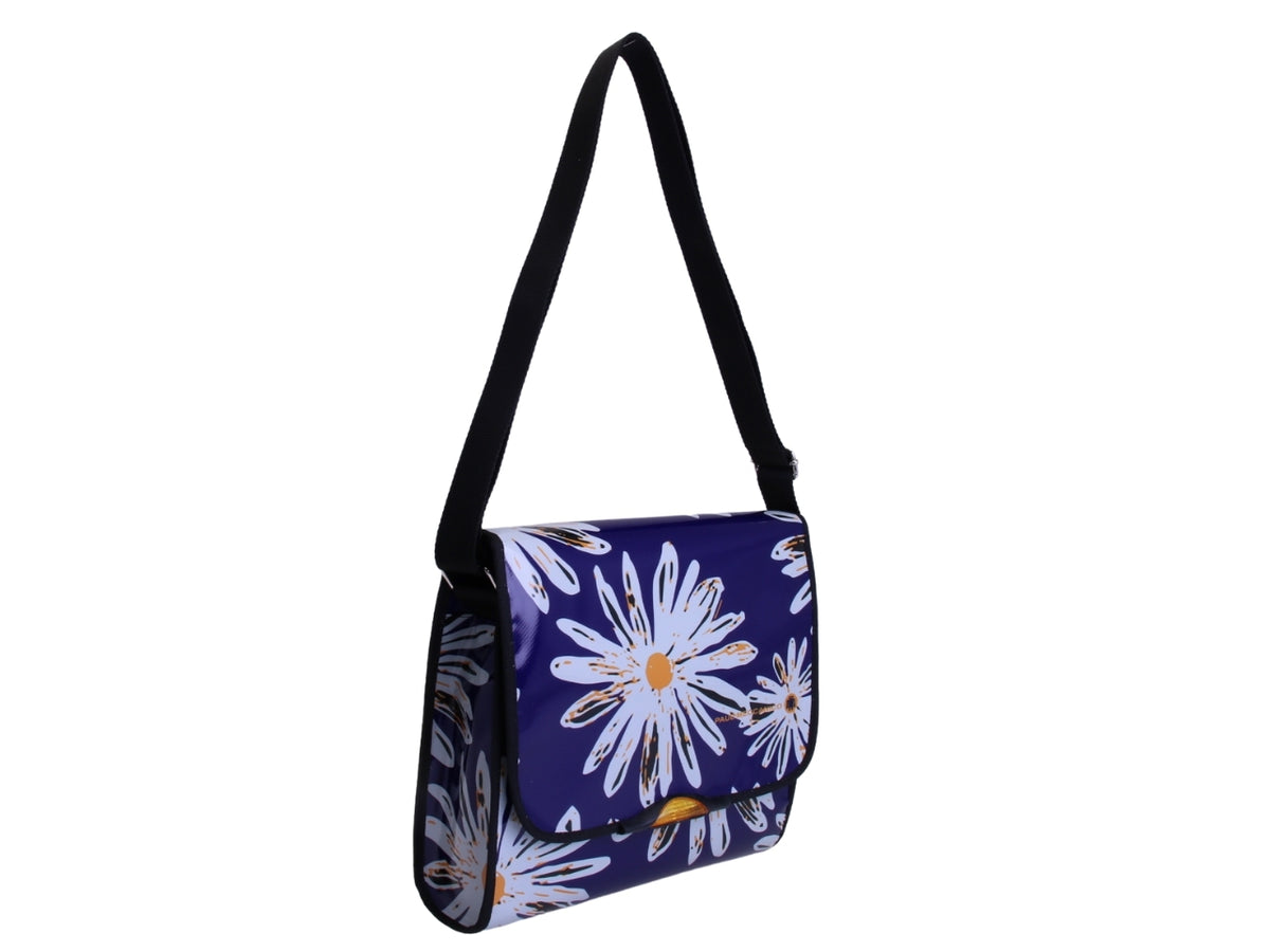 _ CROSSBODY BAG BLUE WITH FLORAL FANTASY. MODEL BREAK MADE OF LORRY TARPAULIN.