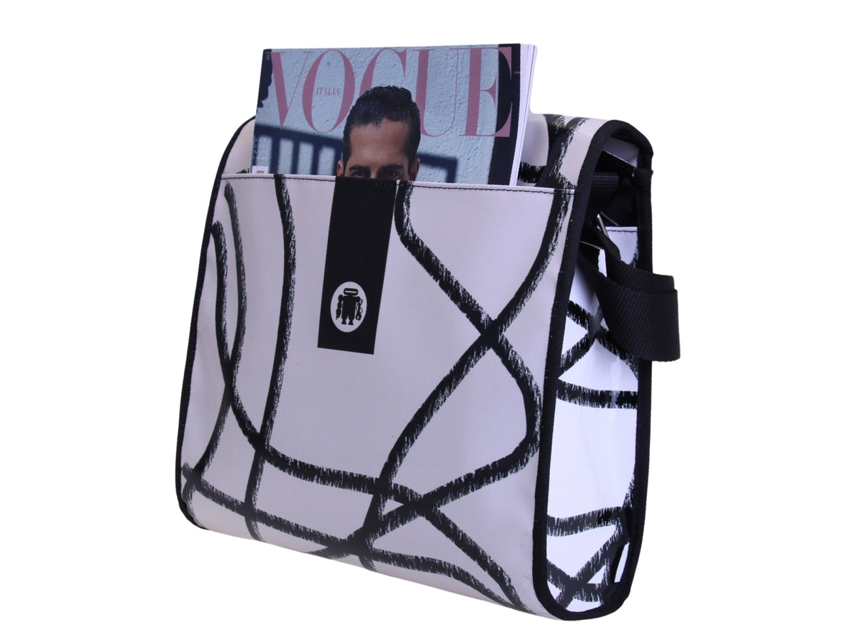 _ CROSSBODY BAG OFF WHITE AND BLACK. MODEL BREAK MADE OF LORRY TARPAULIN.