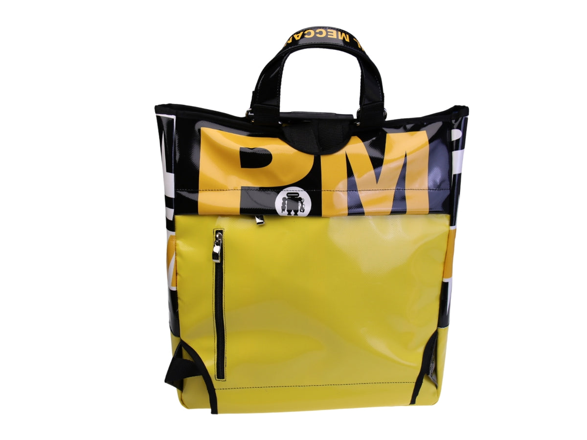 ...2 IN 1 BRIEFCASE AND BACKPACK IN YELLOW COLOUR. MODEL HYBRID MADE OF LORRY TARPAULIN.