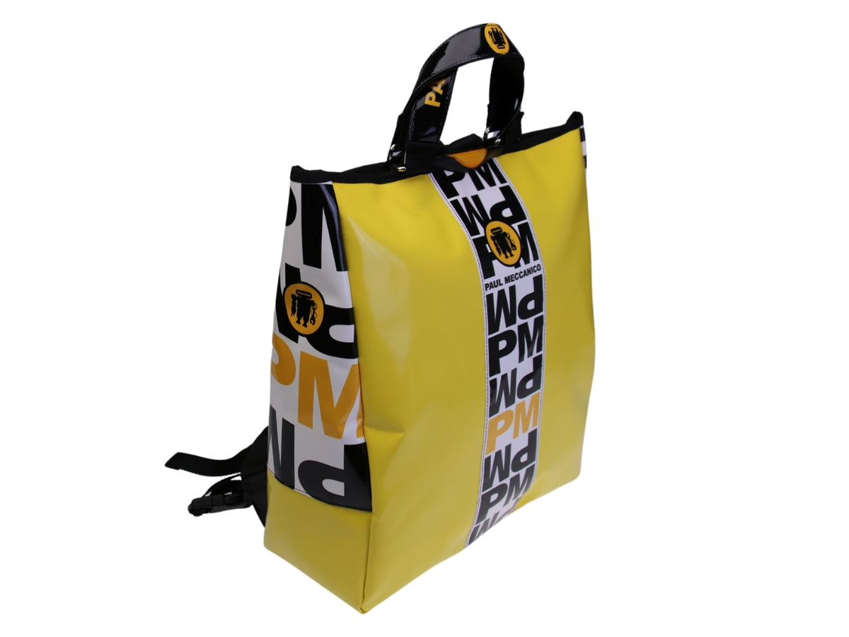 ...2 IN 1 BRIEFCASE AND BACKPACK IN YELLOW COLOUR. MODEL HYBRID MADE OF LORRY TARPAULIN.