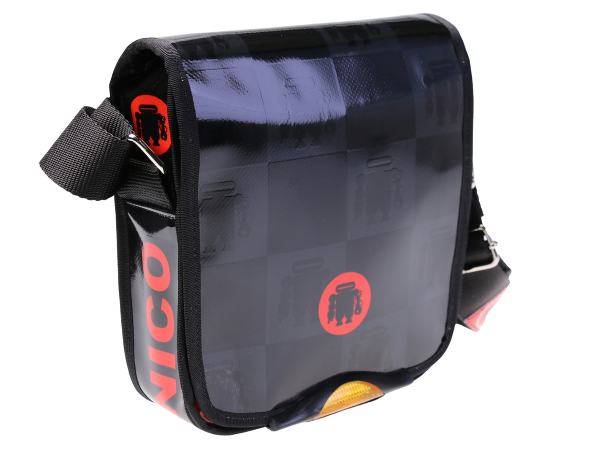 ...BLACK AND RED CROSSBODY BAG. MODEL MIPOK MADE OF LORRY TARPAULIN.