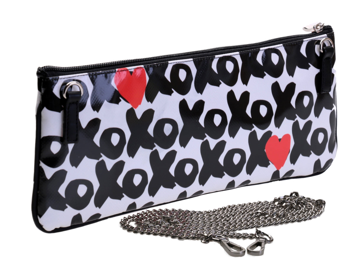BLACK AND WHITE CLUTCH BAG &quot;X0X0&quot;. MODEL RIBELLA MADE OF LORRY TARPAULIN.