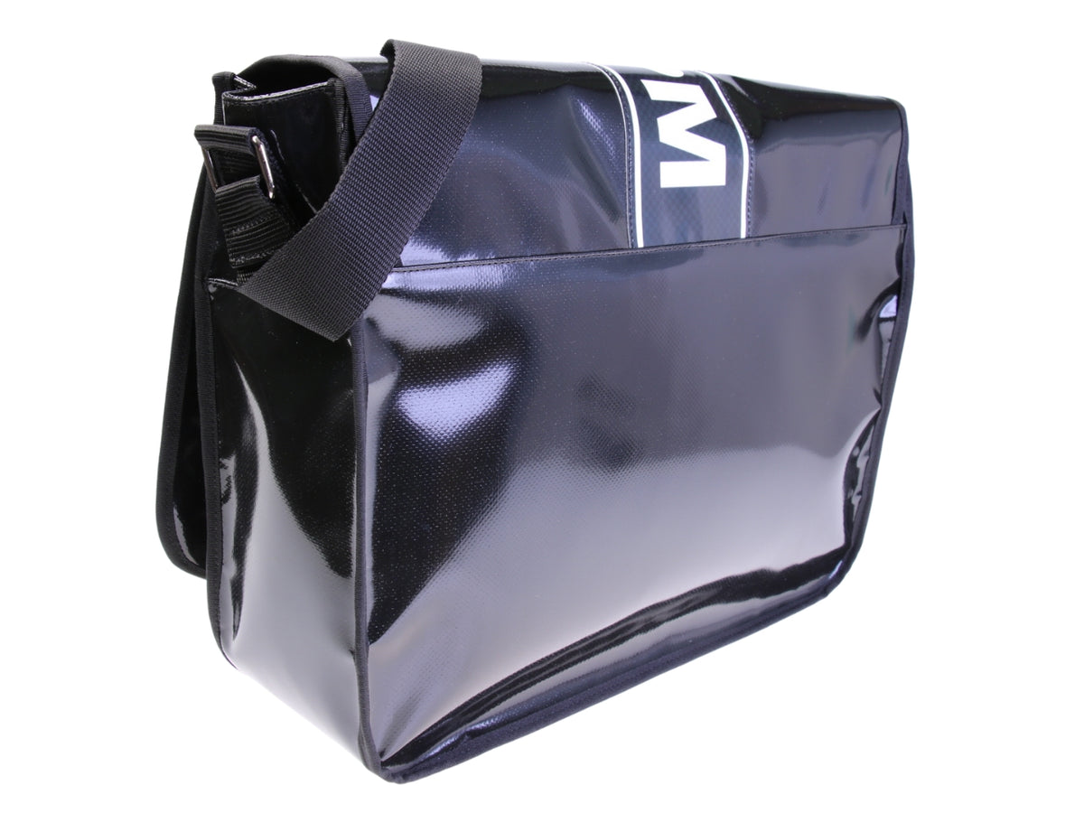 ...BLACK MESSENGER BAG. MODEL SPOT MADE OF LORRY TARPAULIN.