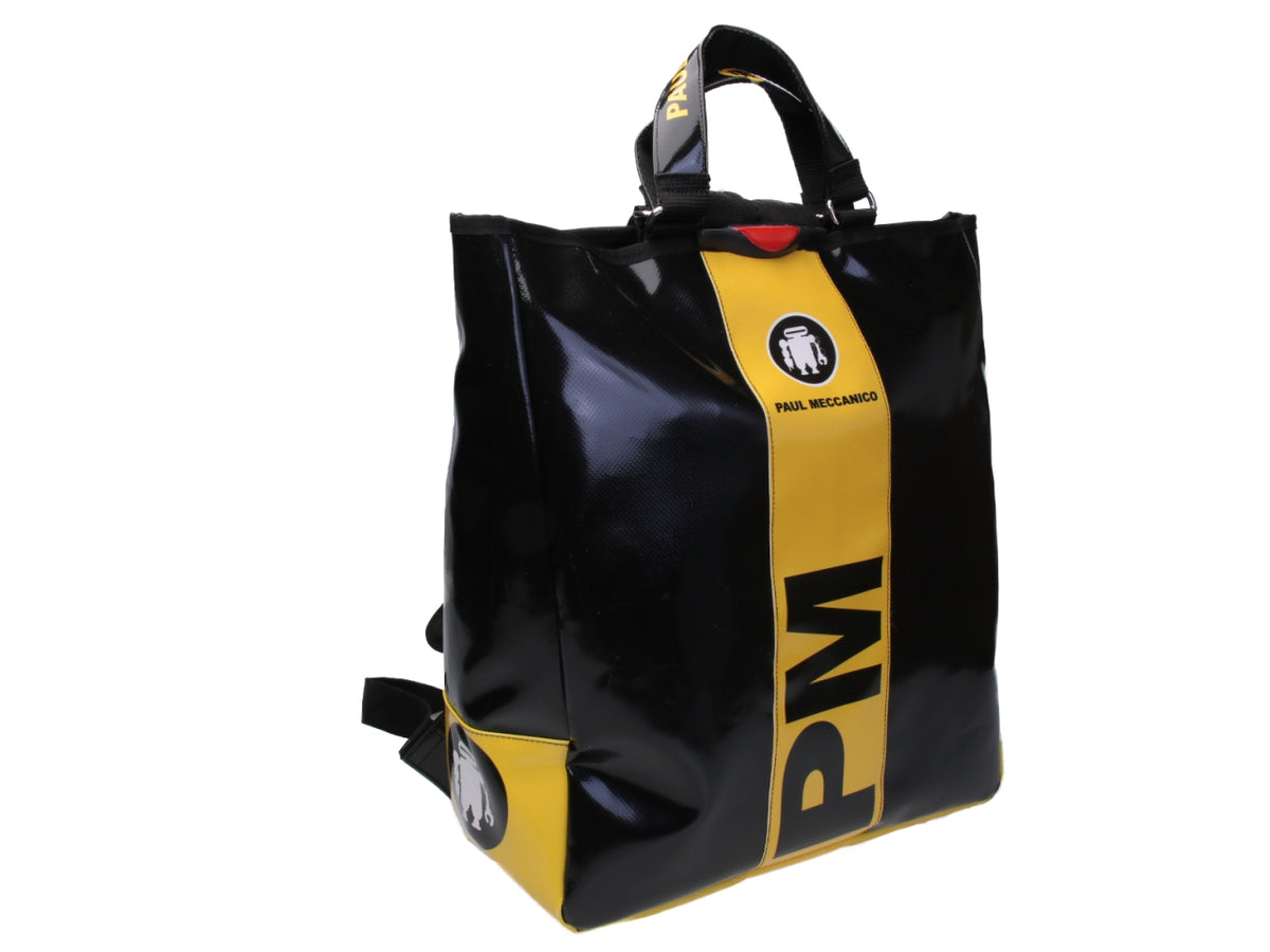 2 IN 1 BRIEFCASE AND BACKPACK BLACK WITH YELLOW. MODEL HYBRID MADE OF LORRY TARPAULIN.
