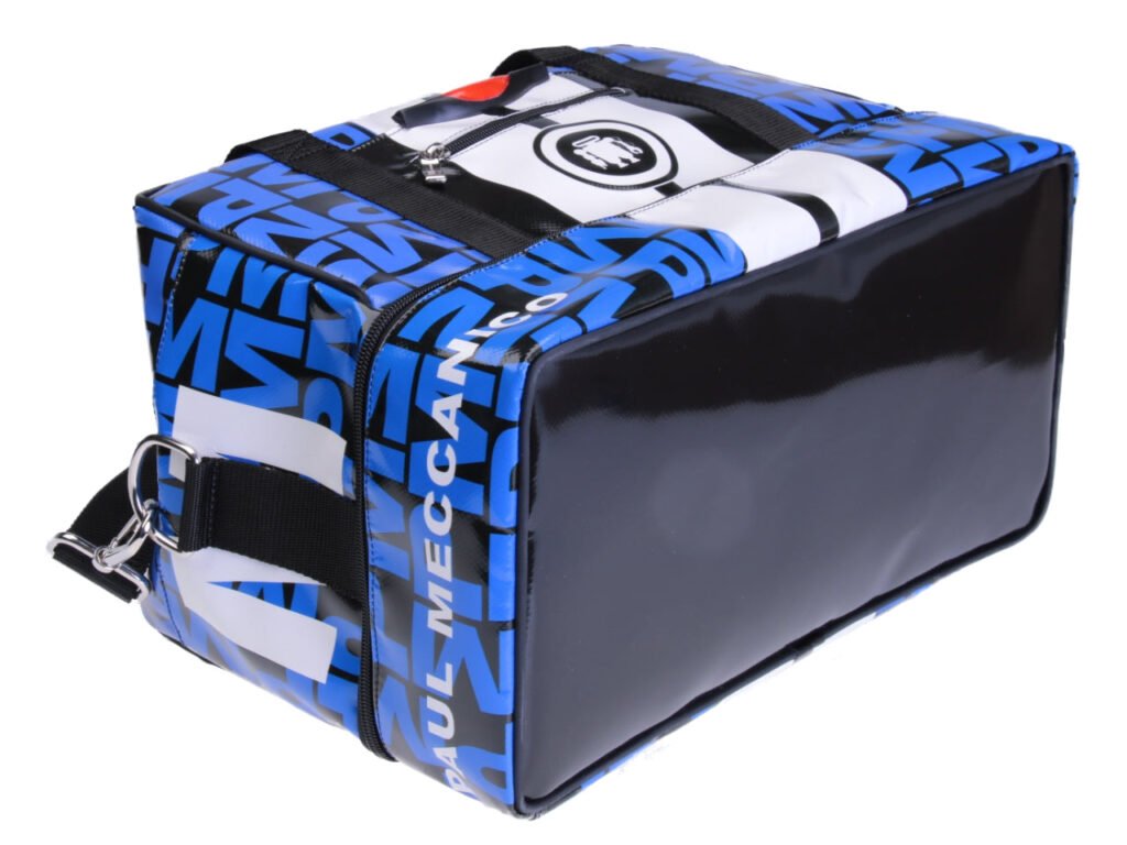 HAND LUGGAGE BAG BLACK, BLUE AND WHITE 40 X 20 X 25 CM. MODEL FLYME MADE OF LORRY TARPAULIN.