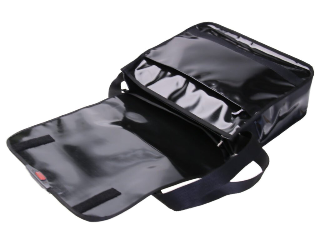 BLACK MESSENGER BAG. MODEL SPOT MADE OF LORRY TARPAULIN.