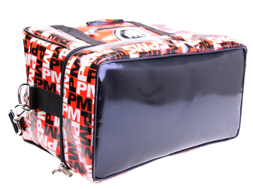 RED HAND LUGGAGE BAG WITH LETTERING FANTASY 40 X 20 X 25 CM. MODEL FLYME MADE OF LORRY TARPAULIN.