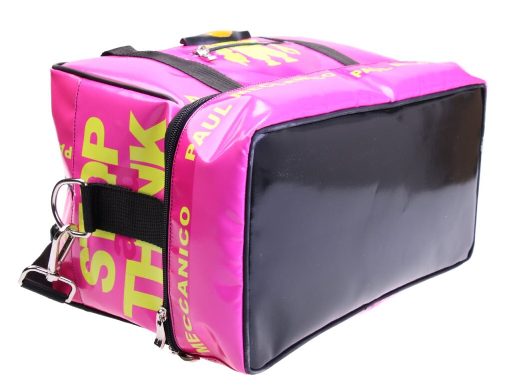 FUCHSIA HAND LUGGAGE BAG 40 X 20 X 25 CM. MODEL FLYME MADE OF LORRY TARPAULIN.