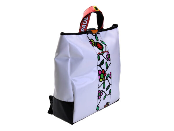 2 IN 1 BRIEFCASE AND BACKPACK WHITE WITH FLORAL FANTASY. MODEL HYBRID MADE OF LORRY TARPAULIN.