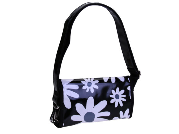 ...CLUTCH BAG FLORAL FANTASY. MODEL CANDY MADE OF LORRY TARPAULIN.