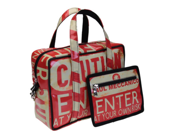 RECTANGULAR WOMEN'S BAG "ENTER AT YOUR OWN RISK". MODEL PINCA MADE OF LORRY TARPAULIN.