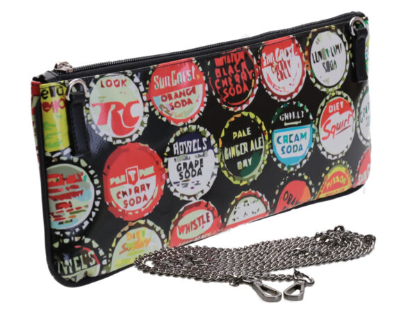 CLUTCH BAG "BOTTLE CAPS". MODEL RIBELLA MADE OF LORRY TARPAULIN.