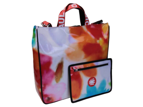 MULTICOLOR MAXI TOTE BAG WITH FLORAL FANTASY . MODEL AIRSTONE MADE OF LORRY TARPAULIN.